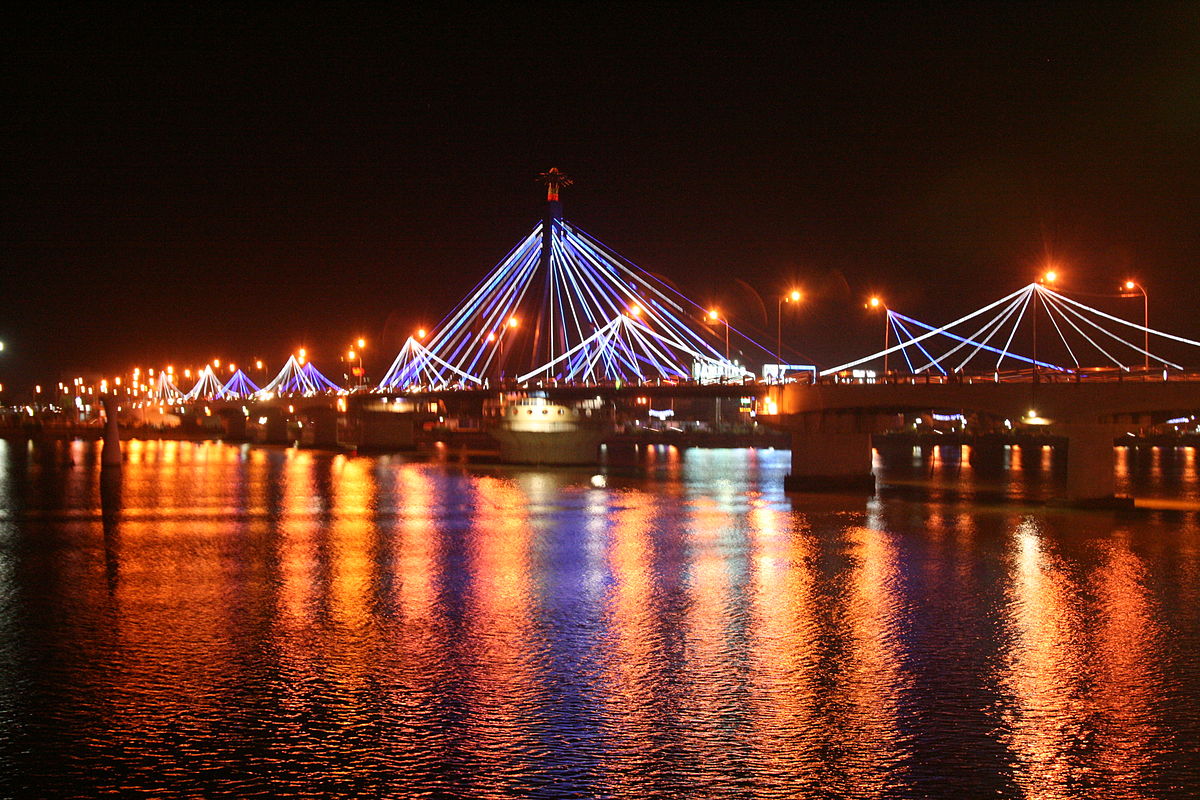 Han River Bridge sparkles the river by night in Da Nang