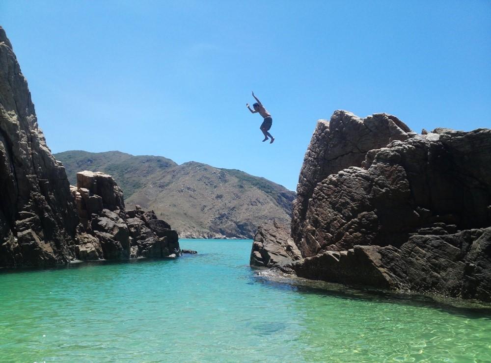 jumping-into-the-cool-water-of-ky-co-beach-saigon-riders