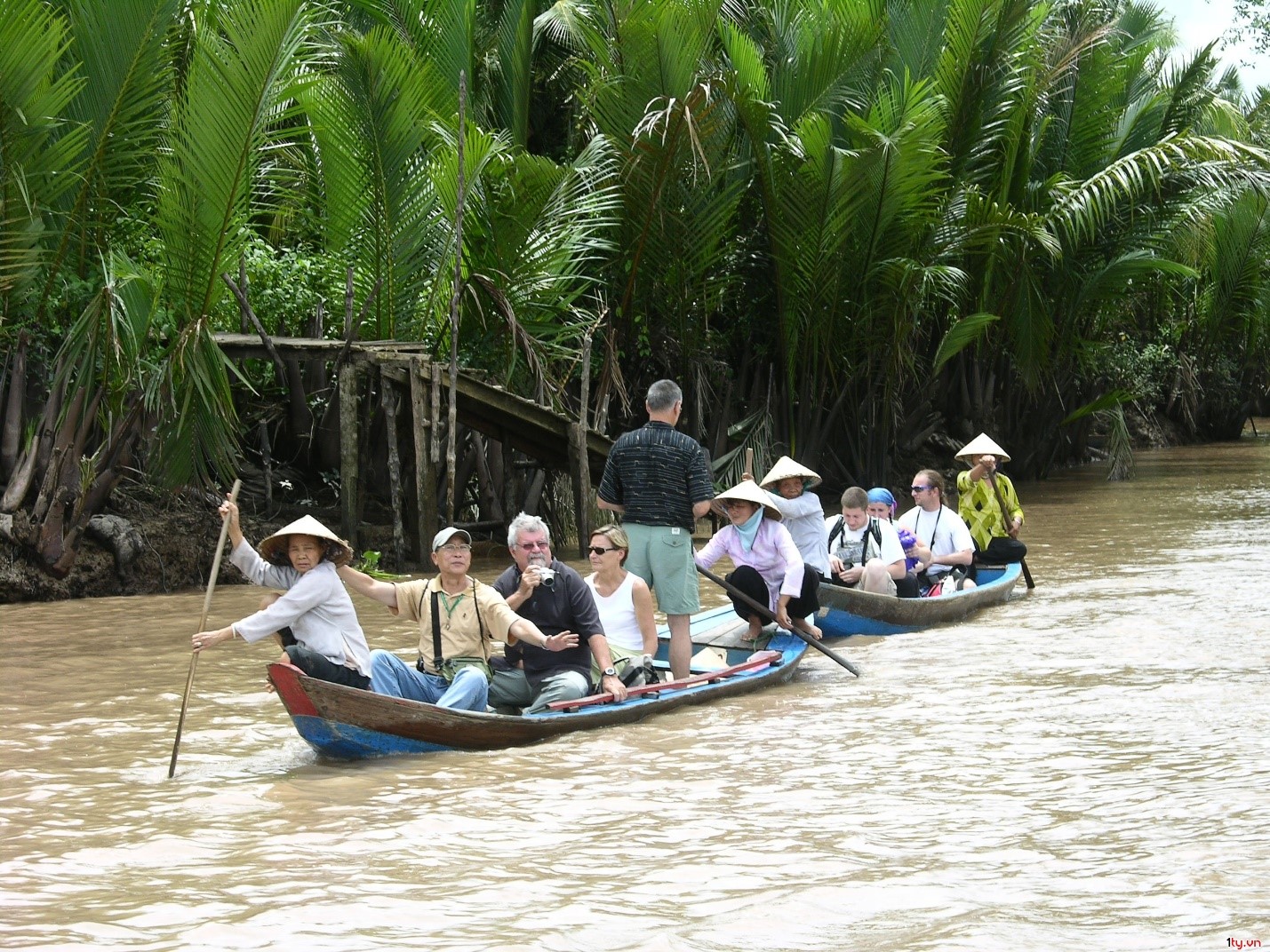 touring-on-a-boat-should-always-be-included-in-a-mekong-adventure-tour-saigon-riders