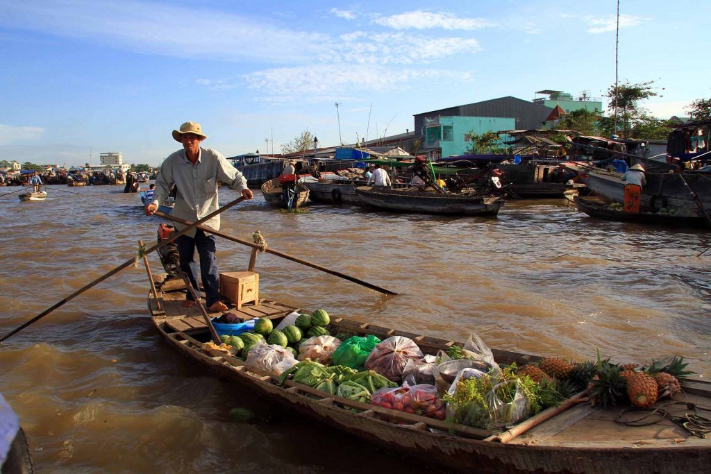 Trading on a boat in Mekong floating market