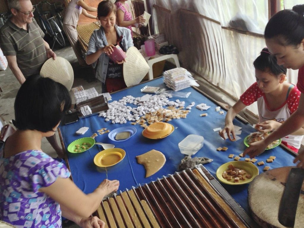 Watching the making of coconut candy